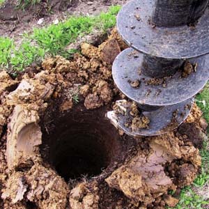 Буровые работы и установка столбов
